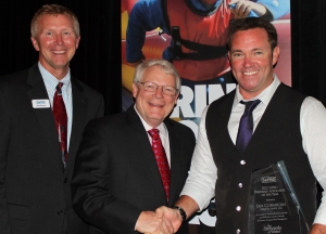 SePRO President Bill Cullpepper and Aquatic Manager Sam Barrick award Aquatechnex Ian Cormican the Applicator of the Year Award
